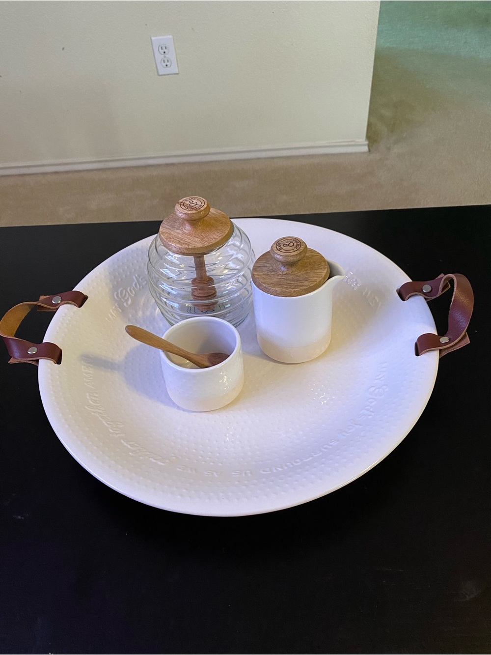 White Ceramic Serving Tray with Wooden-Top Jars and Leather Handles